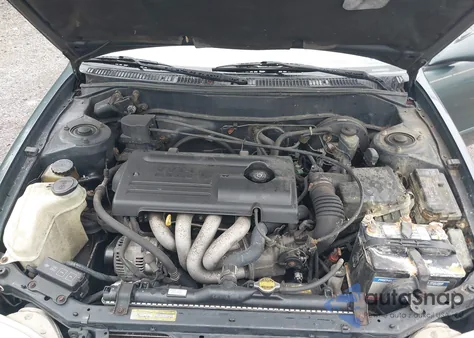 2000 Toyota Corolla Le from USA, damaged, VIN 2T1BR12E2YC309516